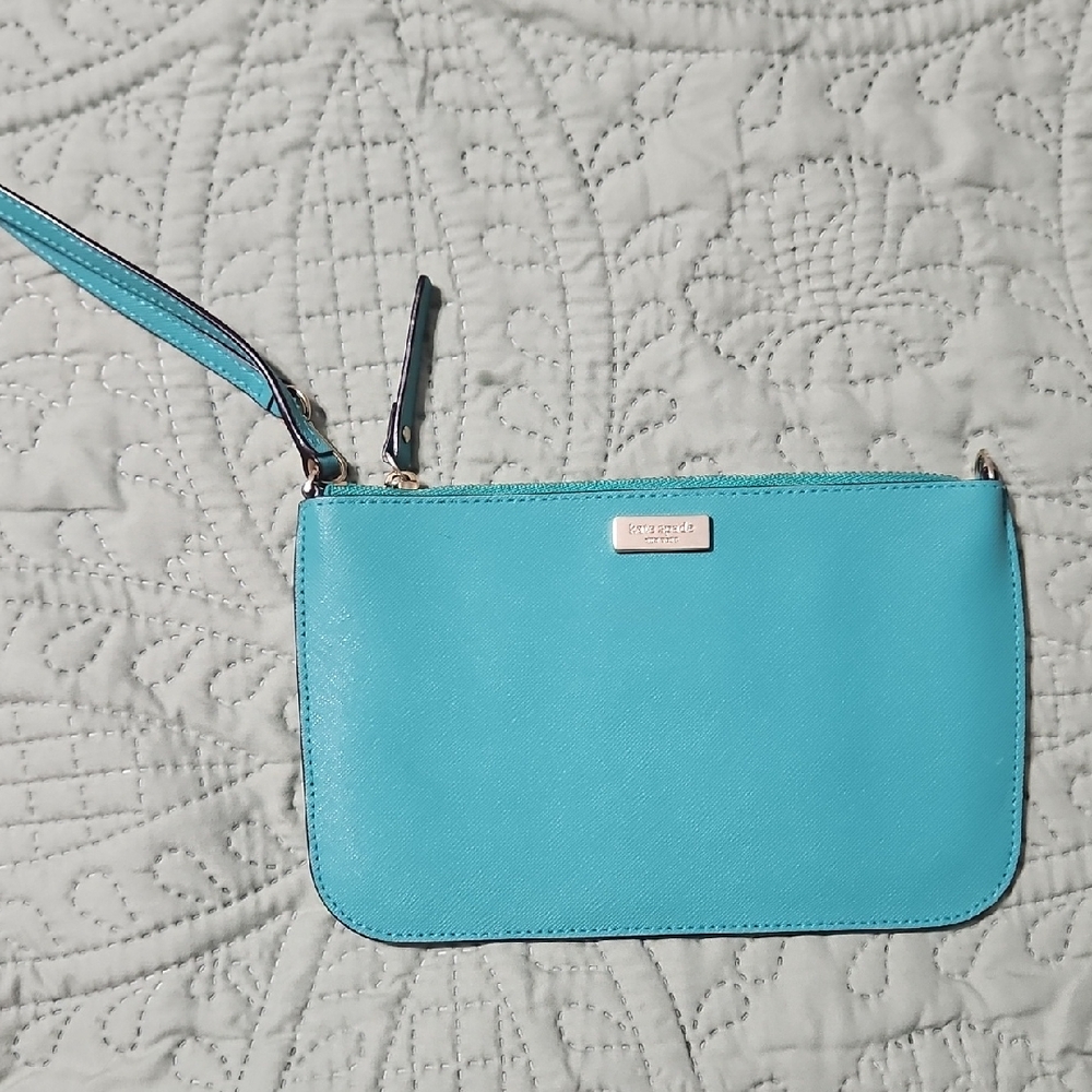 kate spade turquoise wristlet with gold logo plate